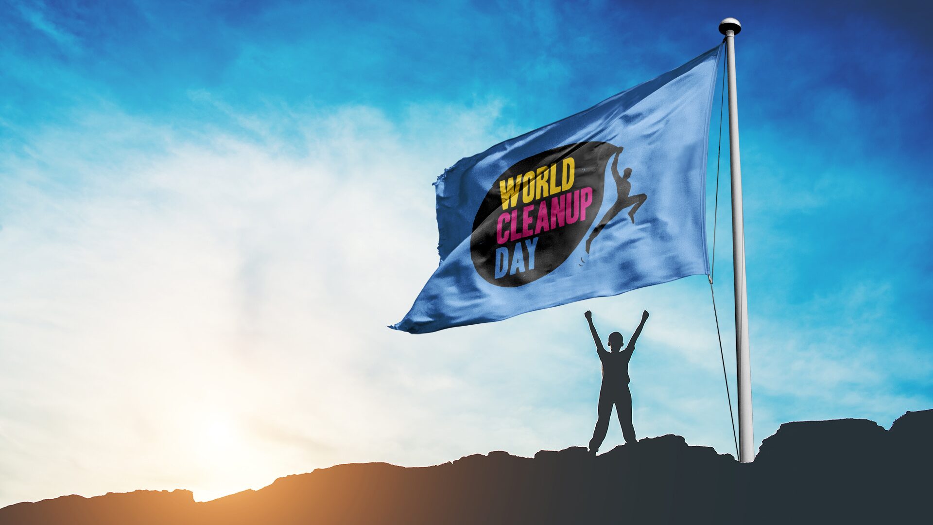 Ein Mensch mit einer Flagge vom Worldclean Up Day